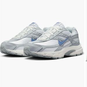 Nike White and Gray Sneakers with Blue Accents
